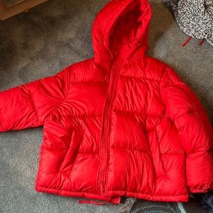 XL Red Puffer. Has nice deep inside and outside pockets..